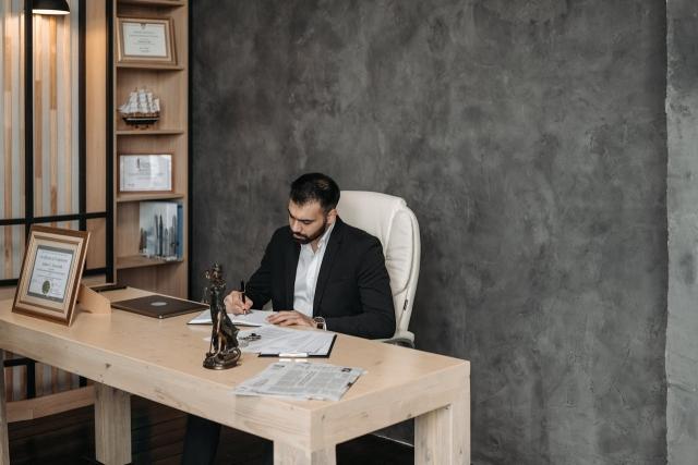 Photo by Pavel Danilyuk: https://www.pexels.com/photo/professional-lawyer-writing-on-a-notebook-8112109/